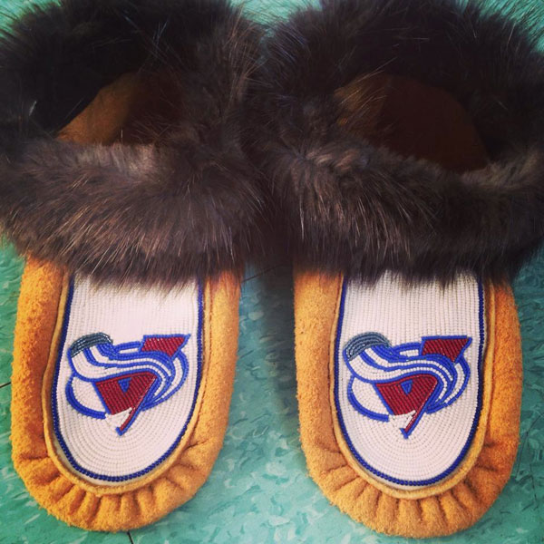 These custom beaded moccasins pay tribute to the Colorado Avalanche. Photo courtesy of Ashton Semple