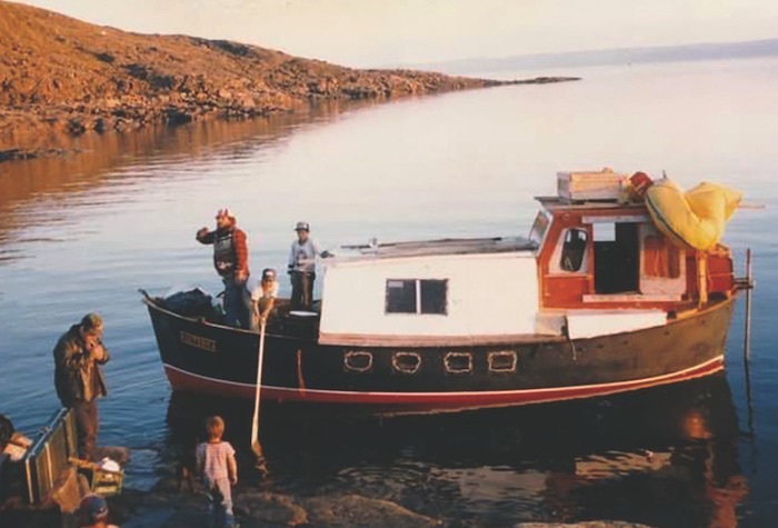 A crew aboard the Esoterica, a Minna lifeboat turned pleasure craft in the '80s. COURTESY Bill Barnie
