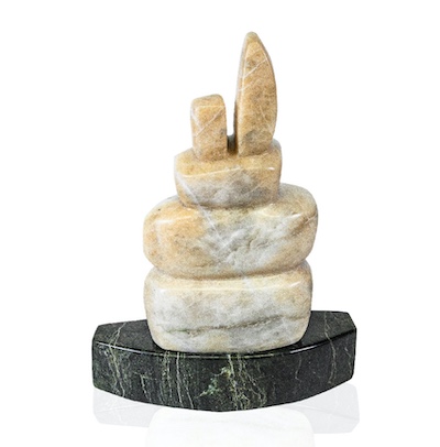 PLAYER OF THE YEAR (Carver: Pitseolak Qimirpik) The nikisuittuq’s top stone points up towards the North Star, and acts as a navigational landmark. Like the player of the year, it leads in the right direction.