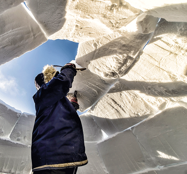 The ingenious iglu: With snow in abundance, Inuit innovated the domed structures to keep warm and out of the wind in winter. Photo by Paul Aningat