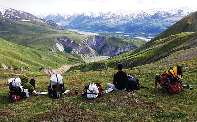 PAUL BURBIDGE AND CREW ENJOY THE DONJEK VALLEY VIEW. Photo courtesy of Paul Burbidge.