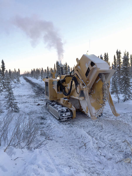 Cutting the line: a T555 saw breaks ground on the Mackenzie Valley Fibre line to Inuvik. COURTESY LEDCOR