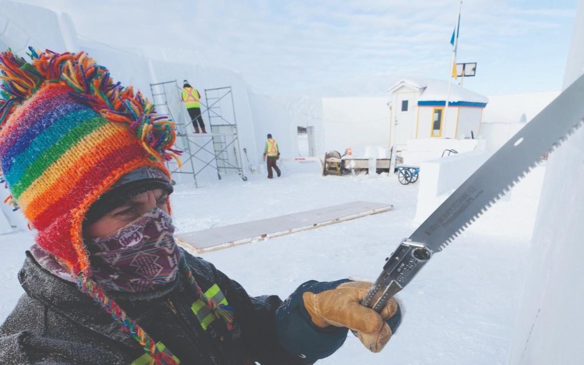 Building Yellowknife's Snowking Castle each year takes weeks of carving.
