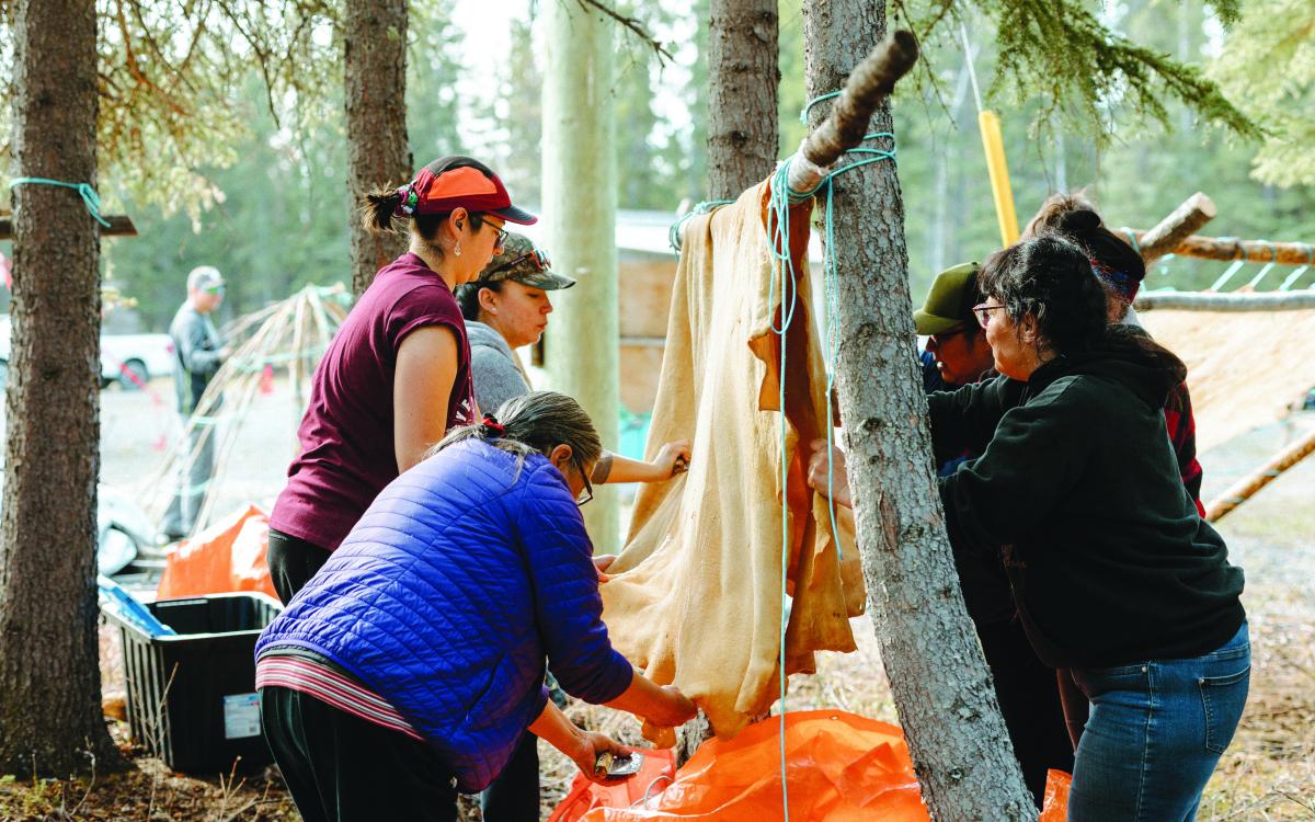 Group working on moosehide.