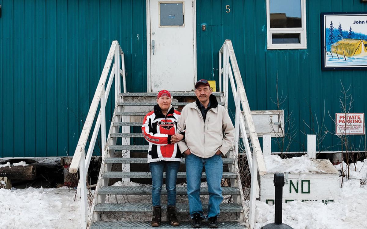 Lorraine Raymond and James Harry on the steps of the John Wayne Kiktorak Centre. “Once we’re out of here, I’m going to work my ass off to keep us out of here,” says Harry. “Right now, a priority is finding a place to stay. And getting a ring for her.”