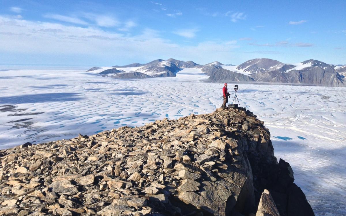 Glaciologist Adrienne White looks out at the Milne Ice Shelf. 