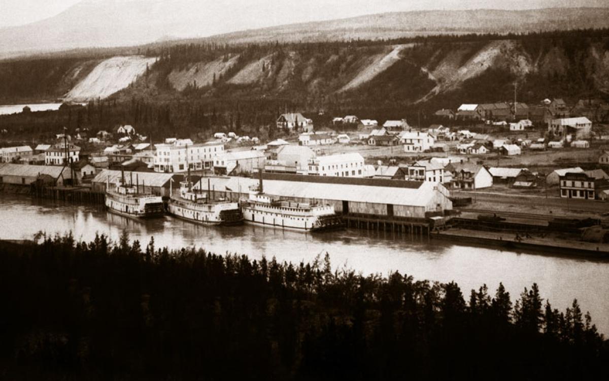 Riverfront roots: Whitehorse, circa the turn of the last century, where paddle-wheeled steamers lined the shores of the Yukon River to carry on good from the end of the White Pass railway.