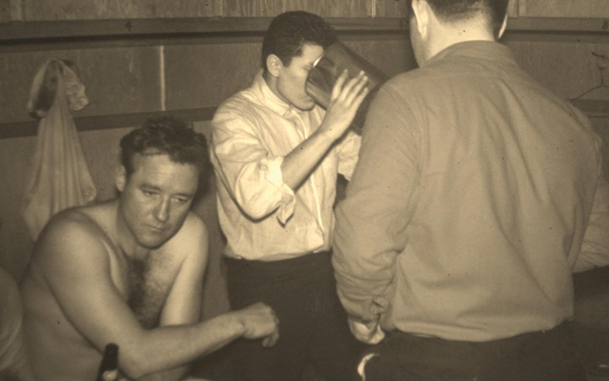 The agony of defeat--shellshocked Molson's players drink bubbly from a gallon pail. Photo courtesy Ron Sulz