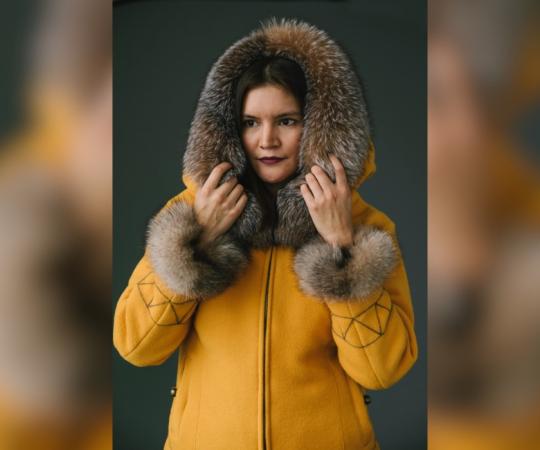 Itoah Scott models one of Papatsi Anrango Kotierk's parkas. 