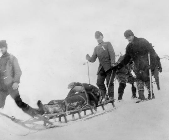 Bringing out the dead: hauling bodies by sled from the summit of the pass, April 3, 1898. Yukon Archives, Anton Vogee Fonds, #71