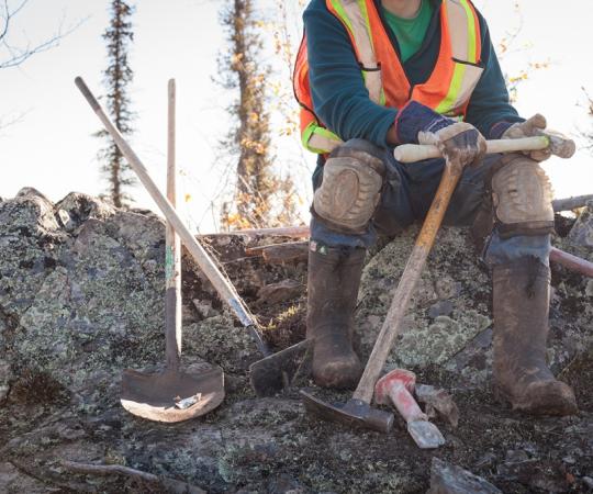 Curtis Overholt takes a break at the TerraX Minerals exploration site about 20 kilometres outside of Yellowknife. Photo by Hannah Eden