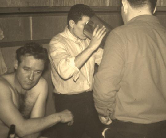 The agony of defeat--shellshocked Molson's players drink bubbly from a gallon pail. Photo courtesy Ron Sulz